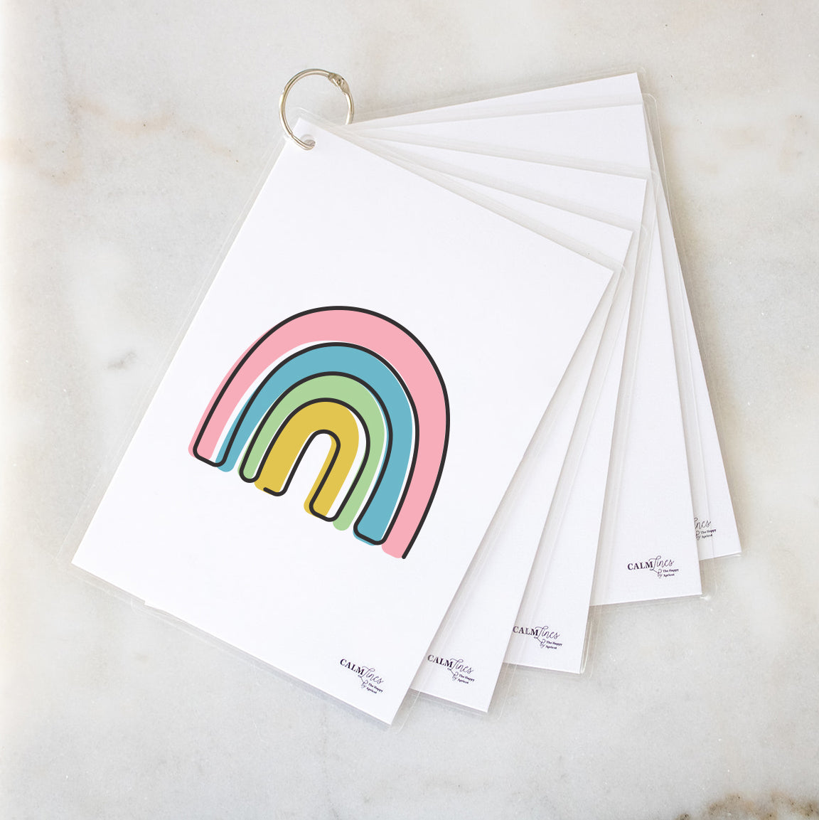 5 laminated cards on silver ring with rainbow single-line illustration.