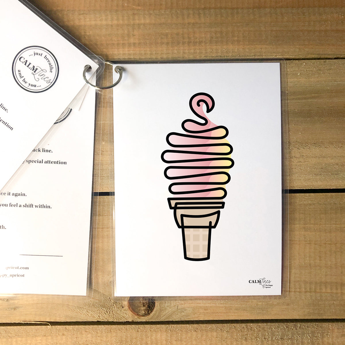 5 laminated cards on silver ring with swirl cone single-line illustration.